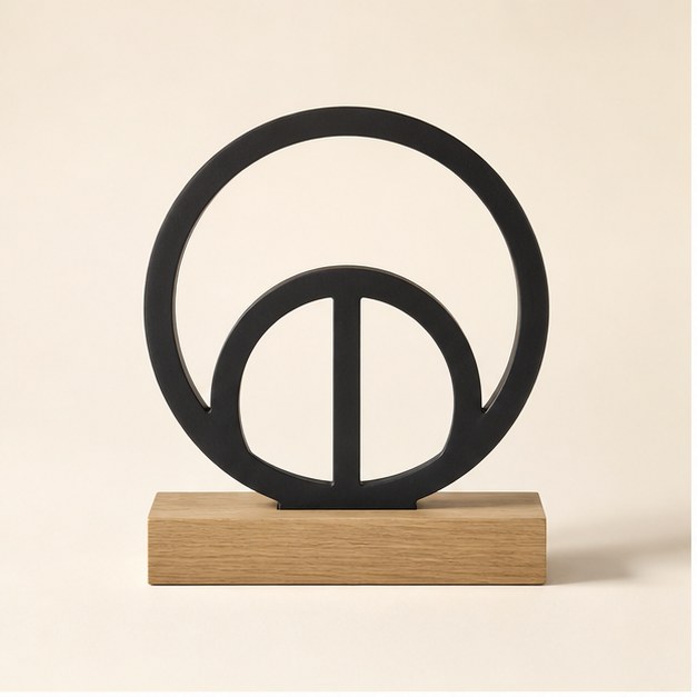 Matte black metal and natural oak tabletop sculpture, front studio view