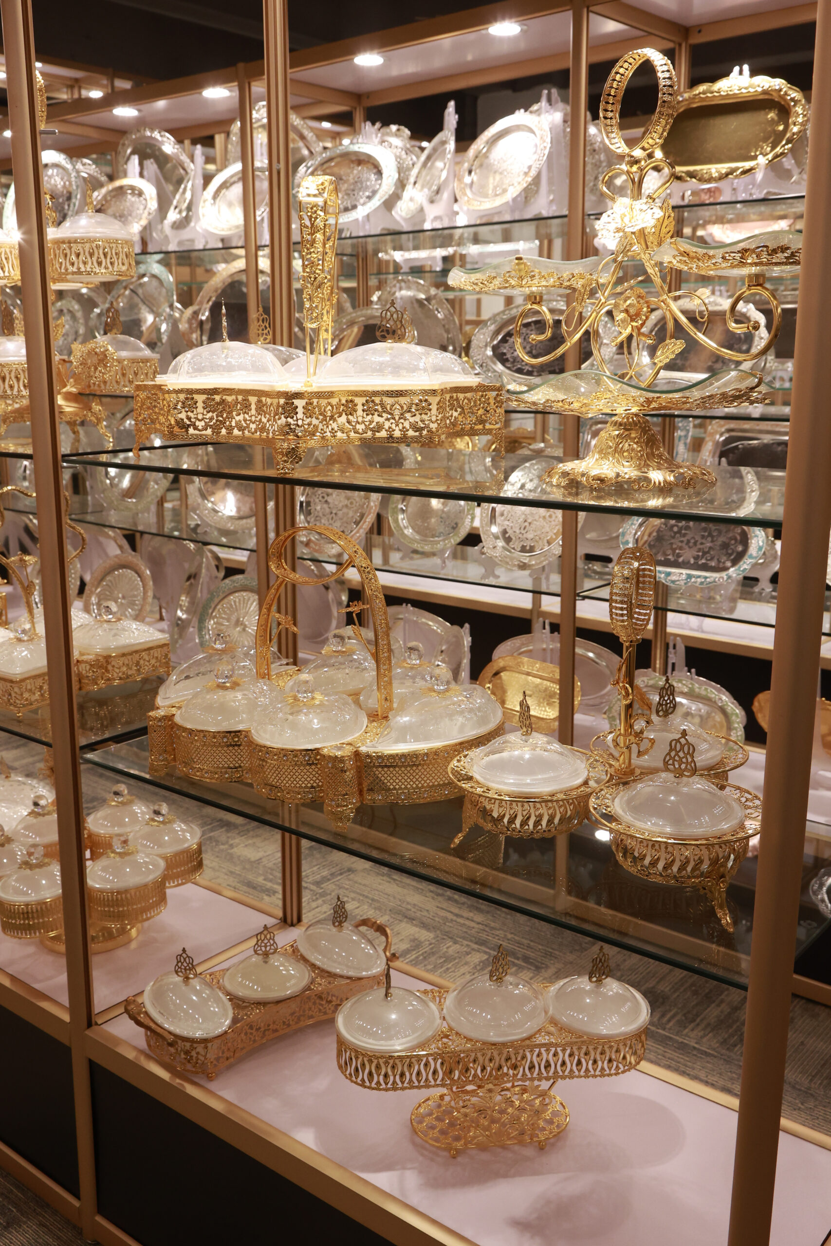 Decorative covered bowls and tiered serving pieces in the LANBORUI showroom